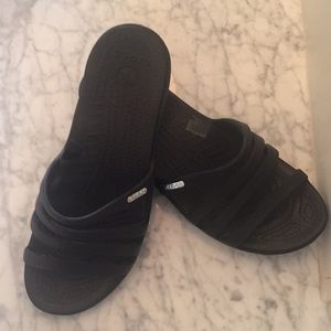 Crocs Slip-Ons. Black. Size 9. Never worn.